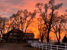 Red Roof Stable Farm at sunset.